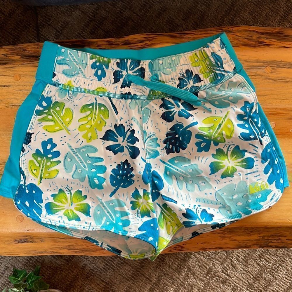 REI board shorts.  Size girls XS (6/7).  Drawstring waist.  Leaf print.